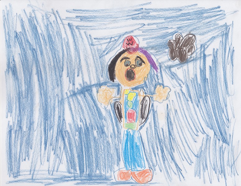 This is me with my purple hair. Those are wings. No, I'm not an angel, I'm a fairy. A singing fairy. I love how she got my Wonder Woman baseball cap just right.